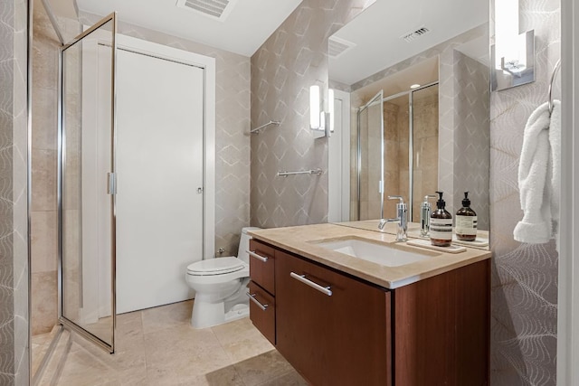 210 Lee Barton Dr Unit 308, Austin, TX 78704 - full bathroom featuring visible vents, a stall shower, toilet, and vanity