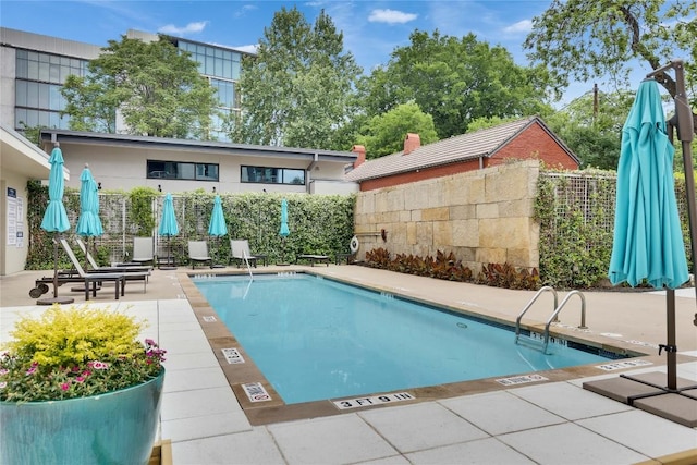 210 Lee Barton Dr Unit 308, Austin, TX 78704 - community pool featuring fence and a patio