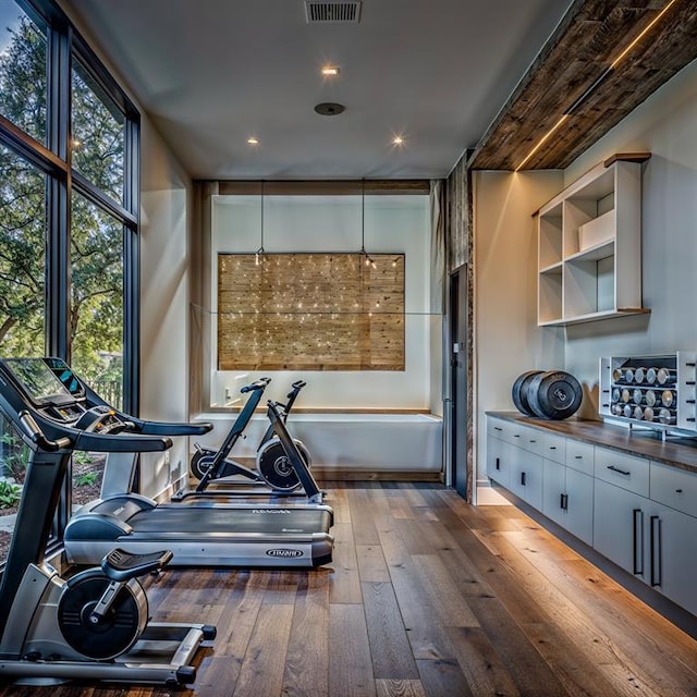 2121 Camino Way, Canyon Lake, TX 78133 - workout area with wood-type flooring, plenty of natural light, and recessed lighting