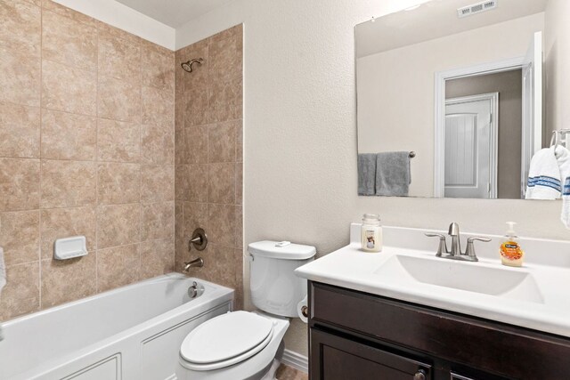 464 Evening Star, Kyle, TX 78640 - bathroom with vanity, toilet, and bathing tub / shower combination