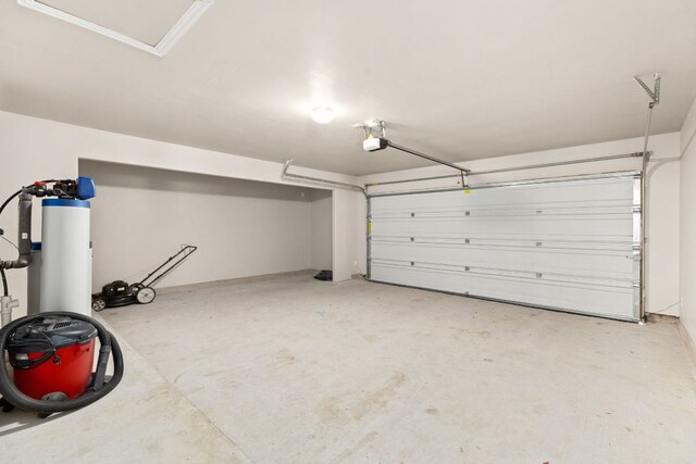 464 Evening Star, Kyle, TX 78640 - garage featuring a garage door opener
