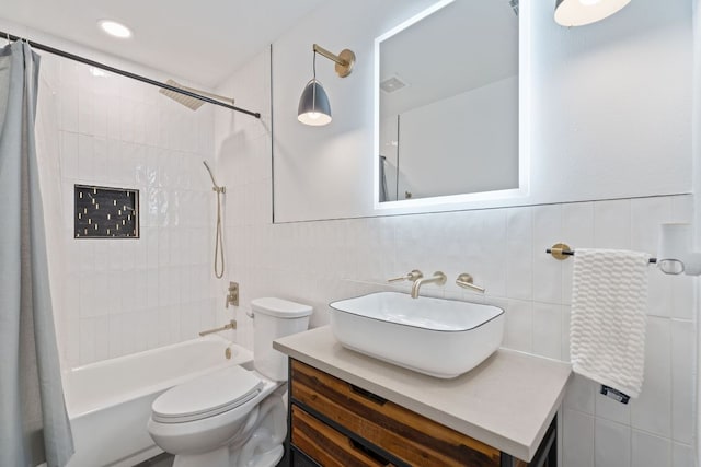 9706 Woodshire Dr, Austin, TX 78748 - bathroom with tile walls, shower / bath combo, and vanity