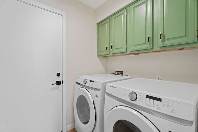 9706 Woodshire Dr, Austin, TX 78748 - laundry area with cabinet space and washer and clothes dryer