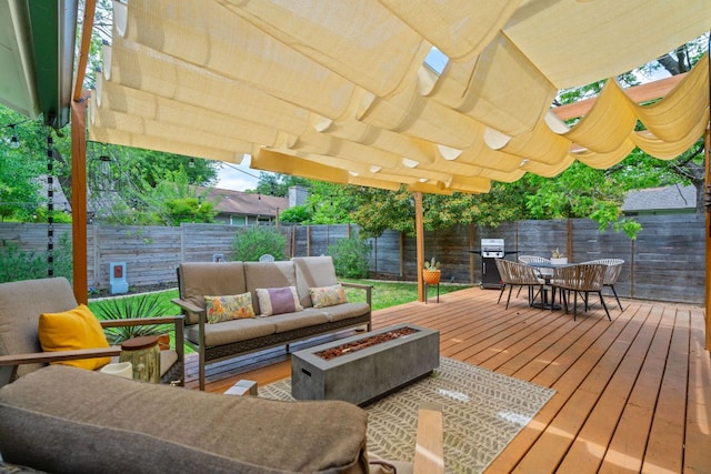 9706 Woodshire Dr, Austin, TX 78748 - deck featuring an outdoor living space with a fire pit, outdoor dining area, and a fenced backyard