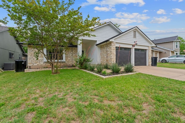 9706 Woodshire Dr, Austin, TX 78748 - view of front facade featuring a garage, stone siding, driveway, and a front lawn