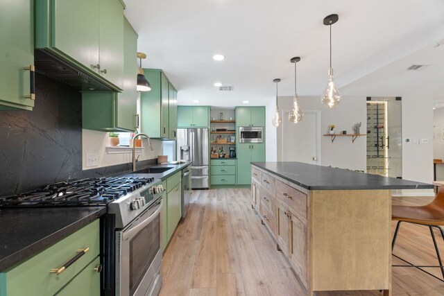 9706 Woodshire Dr, Austin, TX 78748 - kitchen with appliances with stainless steel finishes, green cabinets, dark countertops, open shelves, and recessed lighting