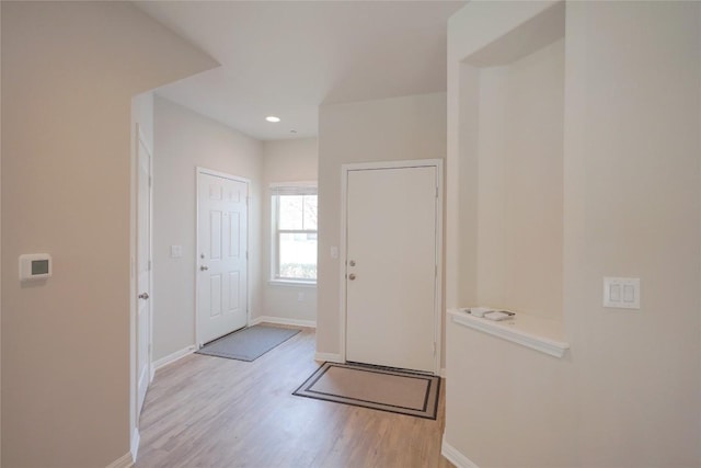 516 E Slaughter Ln Unit 2003, Austin, TX 78744 - entrance foyer featuring baseboards, wood finished floors, and recessed lighting