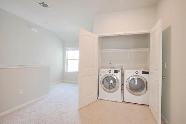 516 E Slaughter Ln Unit 2003, Austin, TX 78744 - laundry room with independent washer and dryer, light carpet, and baseboards