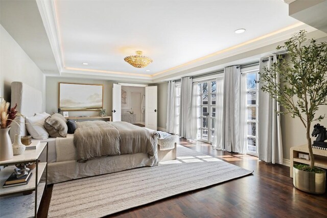 1810 W 35th St, Austin, TX 78703 - bedroom featuring a tray ceiling, access to exterior, crown molding, wood finished floors, and recessed lighting