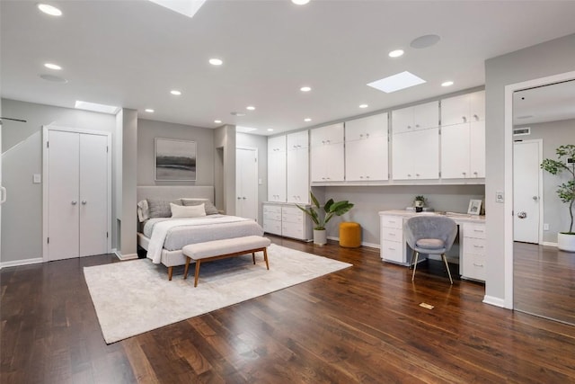 1810 W 35th St, Austin, TX 78703 - bedroom with a skylight, dark wood finished floors, recessed lighting, and built in study area