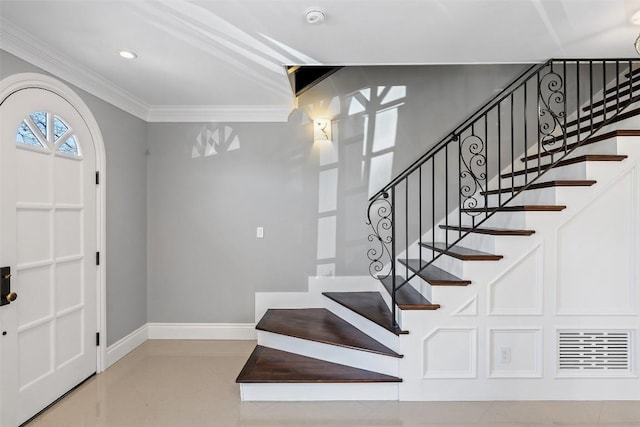 1810 W 35th St, Austin, TX 78703 - foyer entrance featuring ornamental molding, stairway, and recessed lighting
