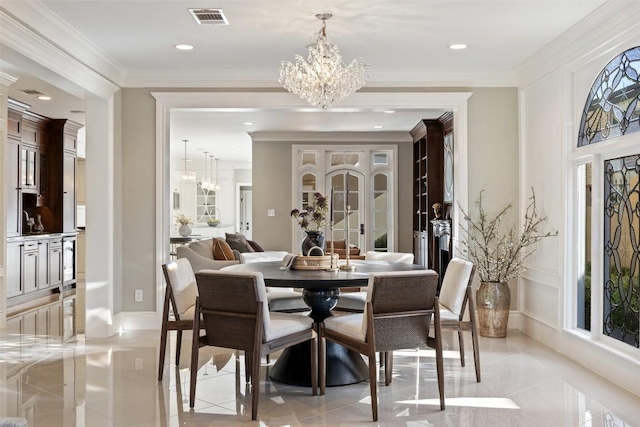 1810 W 35th St, Austin, TX 78703 - dining room with a chandelier, light tile patterned floors, recessed lighting, and crown molding