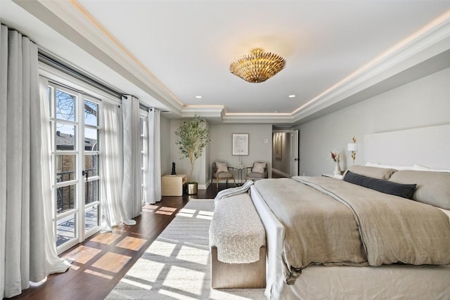 1810 W 35th St, Austin, TX 78703 - bedroom with a tray ceiling, crown molding, wood finished floors, access to outside, and recessed lighting