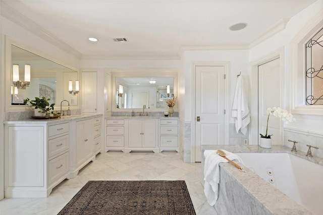 1810 W 35th St, Austin, TX 78703 - bathroom with vanity, a jetted tub, and ornamental molding