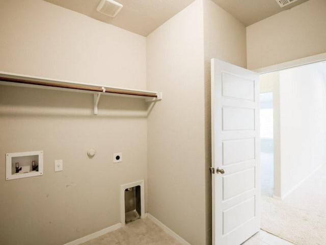 21711 Crystal Way, Lago Vista, TX 78645 - laundry room featuring washer hookup, light colored carpet, electric dryer hookup, and hookup for a gas dryer