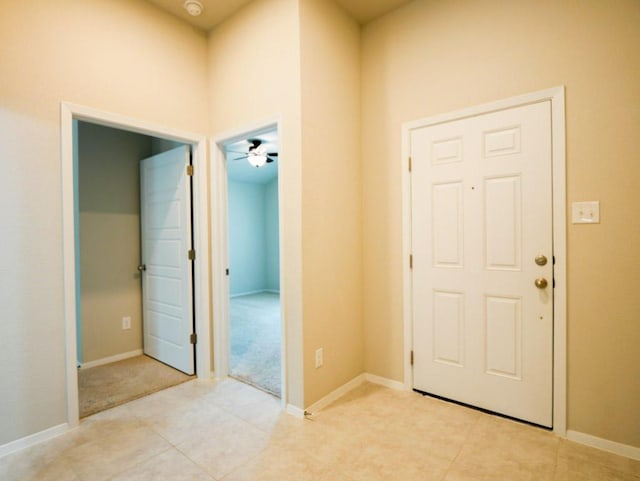 21711 Crystal Way, Lago Vista, TX 78645 - foyer entrance with light tile patterned flooring and ceiling fan