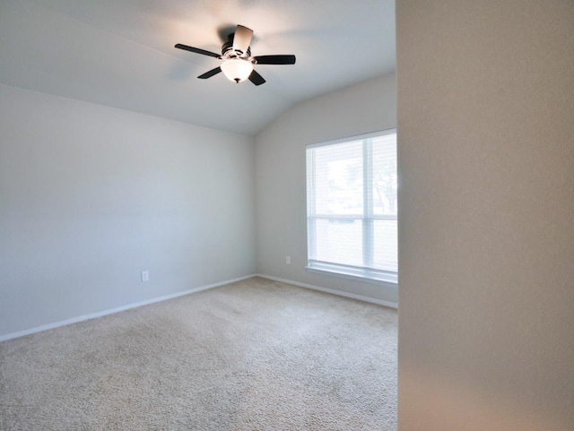 21711 Crystal Way, Lago Vista, TX 78645 - carpeted spare room with a ceiling fan and vaulted ceiling