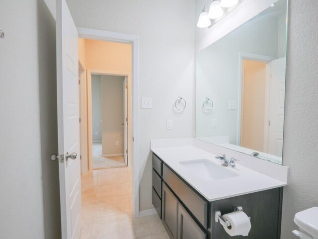 21711 Crystal Way, Lago Vista, TX 78645 - bathroom with vanity, tile patterned floors, and a textured wall