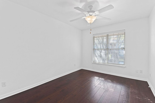 7685 Northcross Dr Unit 728, Austin, TX 78757 - unfurnished room with dark wood-type flooring and a ceiling fan