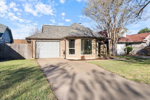 14300 Anita Marie Ln, Austin, TX 78728 - view of front facade with driveway, a garage, and brick siding