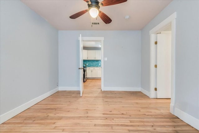 203 Ben Howell Dr, Austin, TX 78704 - unfurnished room with light wood finished floors and ceiling fan