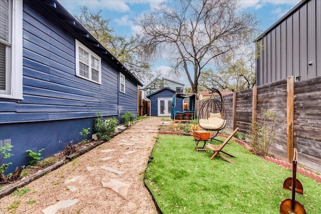 203 Ben Howell Dr, Austin, TX 78704 - fenced backyard with a storage shed