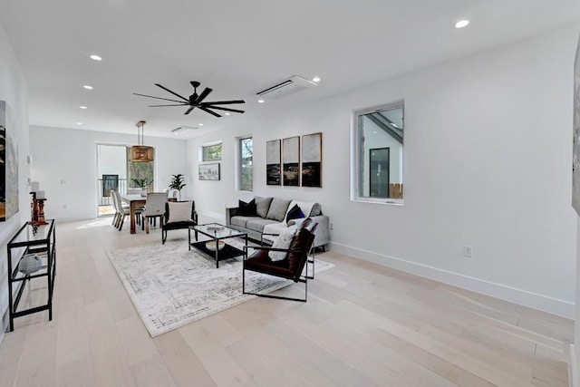 4703 Mount Vernon Dr Unit 1, Austin, TX 78745 - living room with recessed lighting, ceiling fan, and light wood-style flooring
