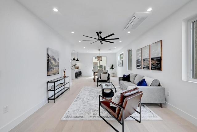 4703 Mount Vernon Dr Unit 1, Austin, TX 78745 - living area with a ceiling fan, recessed lighting, and light wood-style flooring
