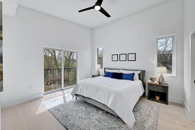 4703 Mount Vernon Dr Unit 1, Austin, TX 78745 - bedroom with access to outside, light wood-style flooring, ceiling fan, and a towering ceiling