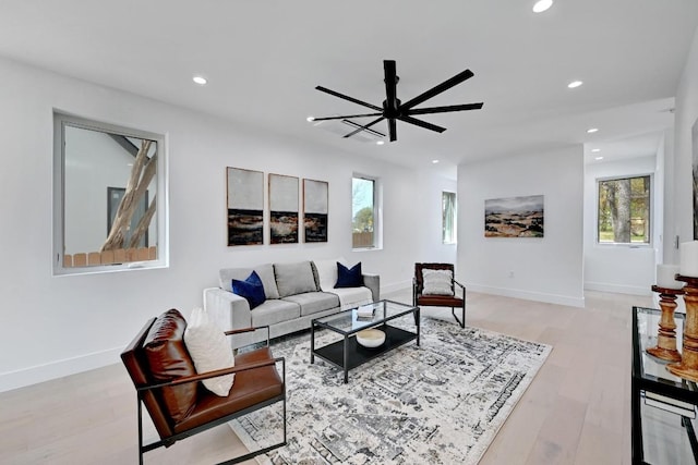 4703 Mount Vernon Dr Unit 1, Austin, TX 78745 - living room featuring recessed lighting, healthy amount of natural light, light wood-type flooring, and a ceiling fan