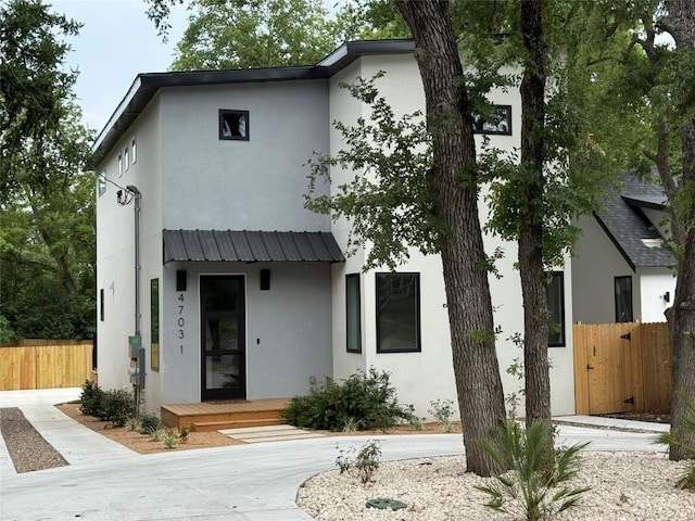 4703 Mount Vernon Dr Unit 1, Austin, TX 78745 - view of front of home featuring stucco siding and a metal roof