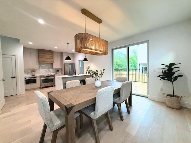 4703 Mount Vernon Dr Unit 1, Austin, TX 78745 - dining room featuring light wood-type flooring and recessed lighting