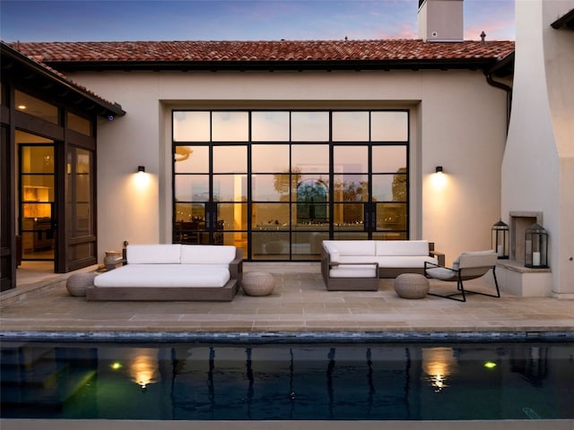 4401 Amarra Dr Unit 14, Austin, TX 78735 - rear view of property featuring an outdoor hangout area, a patio area, a tiled roof, and an outdoor pool
