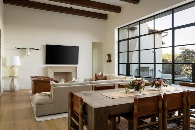 4401 Amarra Dr Unit 14, Austin, TX 78735 - dining room with a high ceiling, light wood-type flooring, and beam ceiling
