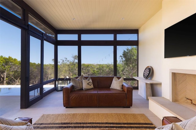4401 Amarra Dr Unit 14, Austin, TX 78735 - sunroom with wood ceiling, floor to ceiling windows, and tile patterned flooring