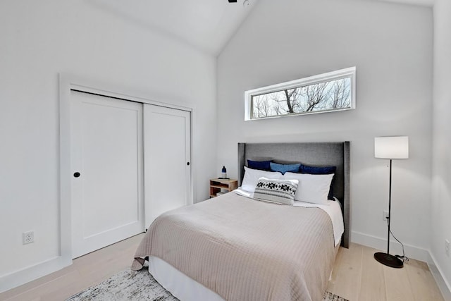 4703 Mount Vernon Dr Unit 2, Austin, TX 78745 - bedroom featuring lofted ceiling, a closet, and wood finished floors