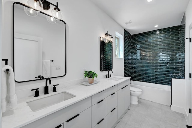 4703 Mount Vernon Dr Unit 2, Austin, TX 78745 - bathroom with double vanity, toilet, shower / bathtub combination, tile patterned flooring, and recessed lighting