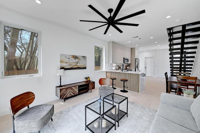 4703 Mount Vernon Dr Unit 2, Austin, TX 78745 - living area featuring recessed lighting, ceiling fan, and light wood finished floors