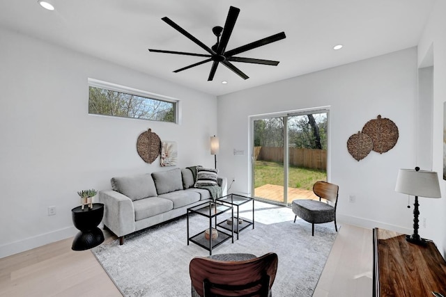 4703 Mount Vernon Dr Unit 2, Austin, TX 78745 - living room featuring healthy amount of natural light, wood finished floors, ceiling fan, recessed lighting, and baseboards