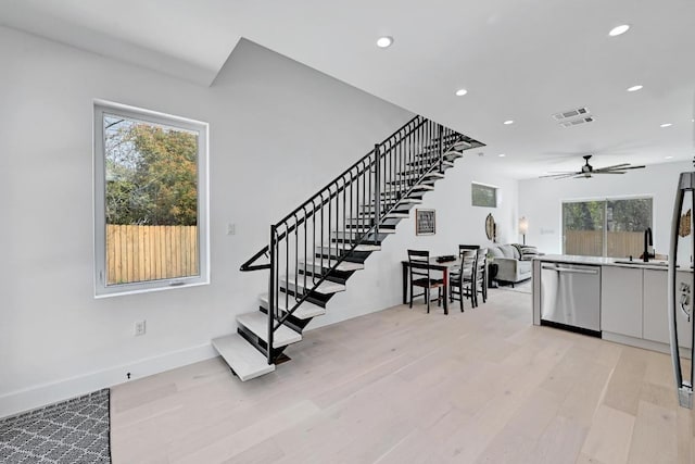 4703 Mount Vernon Dr Unit 2, Austin, TX 78745 - stairway featuring recessed lighting, wood finished floors, and a ceiling fan