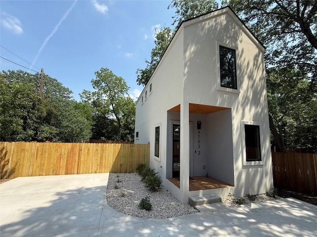 4703 Mount Vernon Dr Unit 2, Austin, TX 78745 - modern home with a patio area and stucco siding