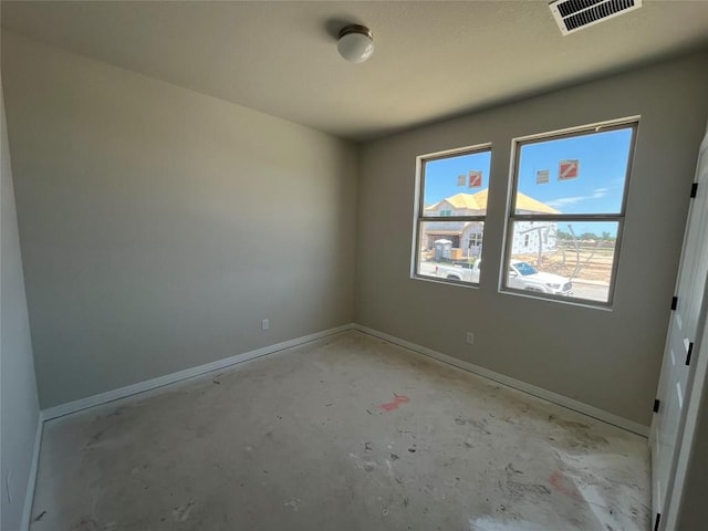 2456 Walking Y Rd, Georgetown, TX 78633 - spare room with concrete floors and baseboards