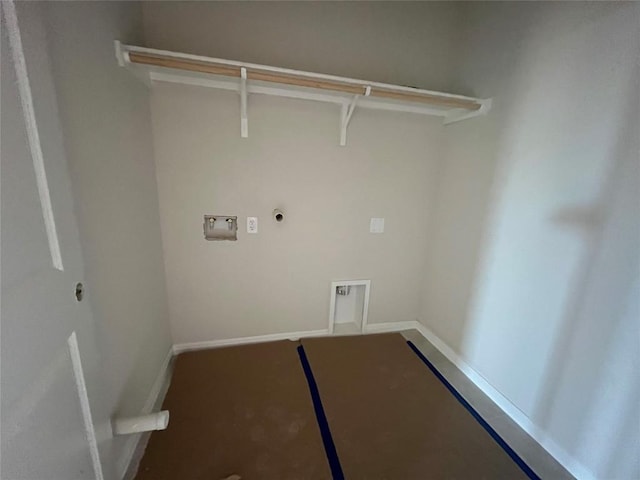 2456 Walking Y Rd, Georgetown, TX 78633 - washroom featuring electric dryer hookup, hookup for a washing machine, and baseboards
