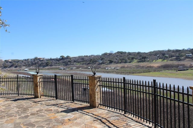 25421 Pedernales Point Dr, Spicewood, TX 78669 - view of patio featuring a water view