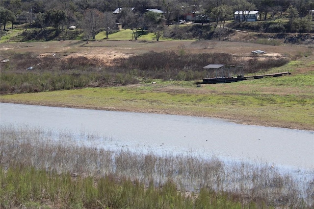 25421 Pedernales Point Dr, Spicewood, TX 78669 - view of asphalt street with a water view