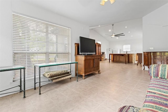 25421 Pedernales Point Dr, Spicewood, TX 78669 - living room featuring ceiling fan, plenty of natural light, lofted ceiling, and light tile patterned floors
