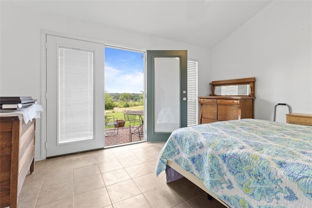 25421 Pedernales Point Dr, Spicewood, TX 78669 - bedroom with lofted ceiling, access to outside, and light tile patterned floors