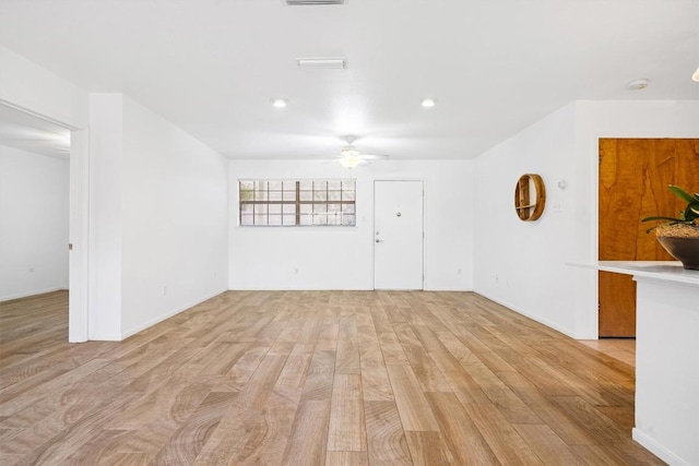 2301 Lawnmont Ave Apt 1, Austin, TX 78756 - unfurnished living room with a ceiling fan, light wood-style flooring, and recessed lighting