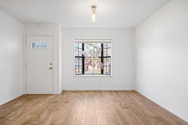 2301 Lawnmont Ave Apt 1, Austin, TX 78756 - foyer with wood finished floors and baseboards