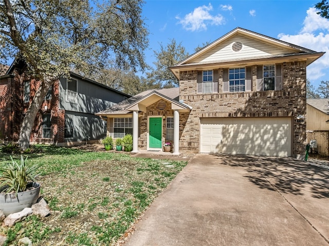 716 Shiny Rock Dr, Austin, TX 78748 - view of front facade with brick siding, an attached garage, and concrete driveway